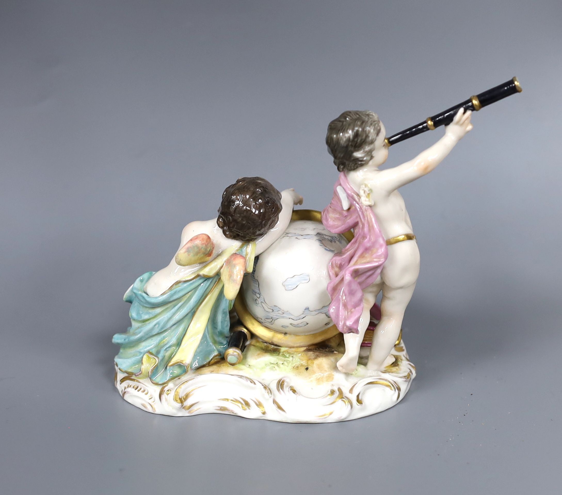 A Meissen style figure group, astrology cherubs, 12cm high